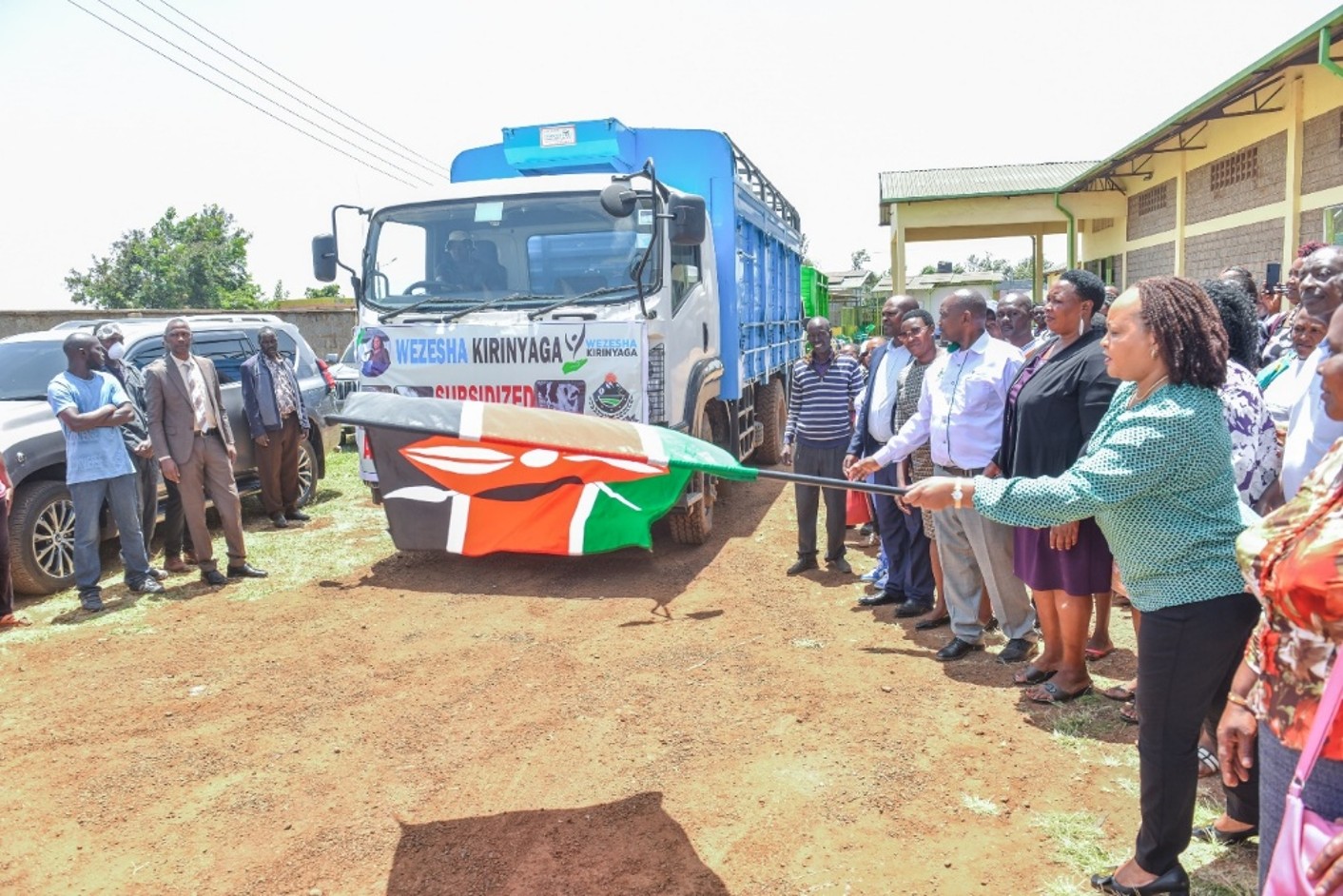 H. E Governor Anne Waiguru flagging off trucks of subsidized animal feeds to benefit over 30,000 farmers at Kiaga feeds factory in Kirinyaga County